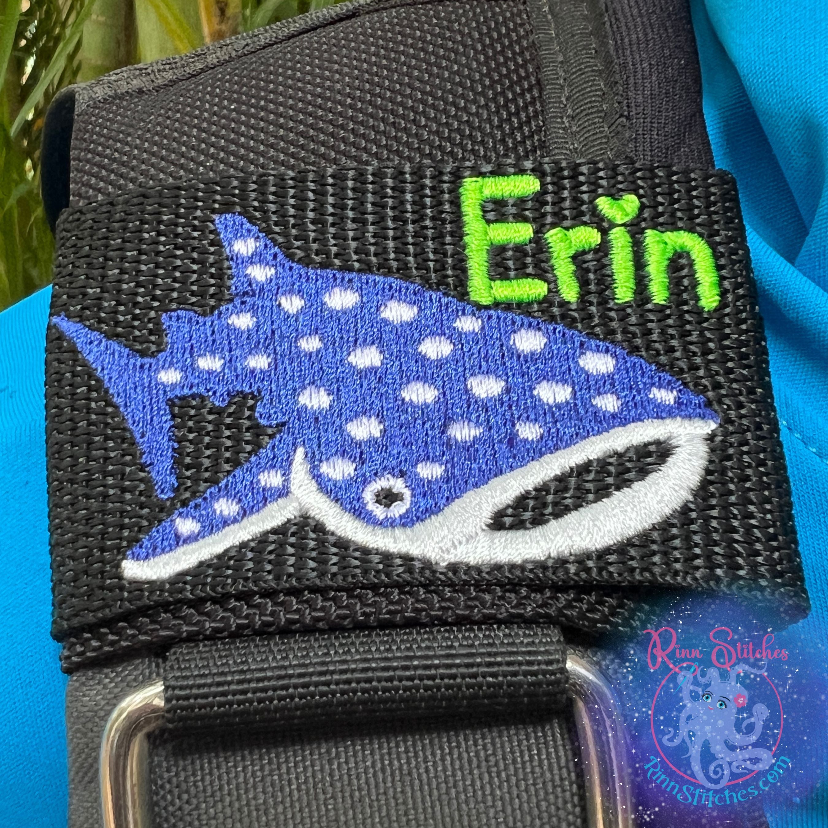 Cute whale shark personalized BCD tag blue abyss white silver cartoonish design custom embroidered name scuba diving accessories - Name Erin in Neon Green and Haliimaile Font - Made by Rinn Stitches in Maui, Hawaii