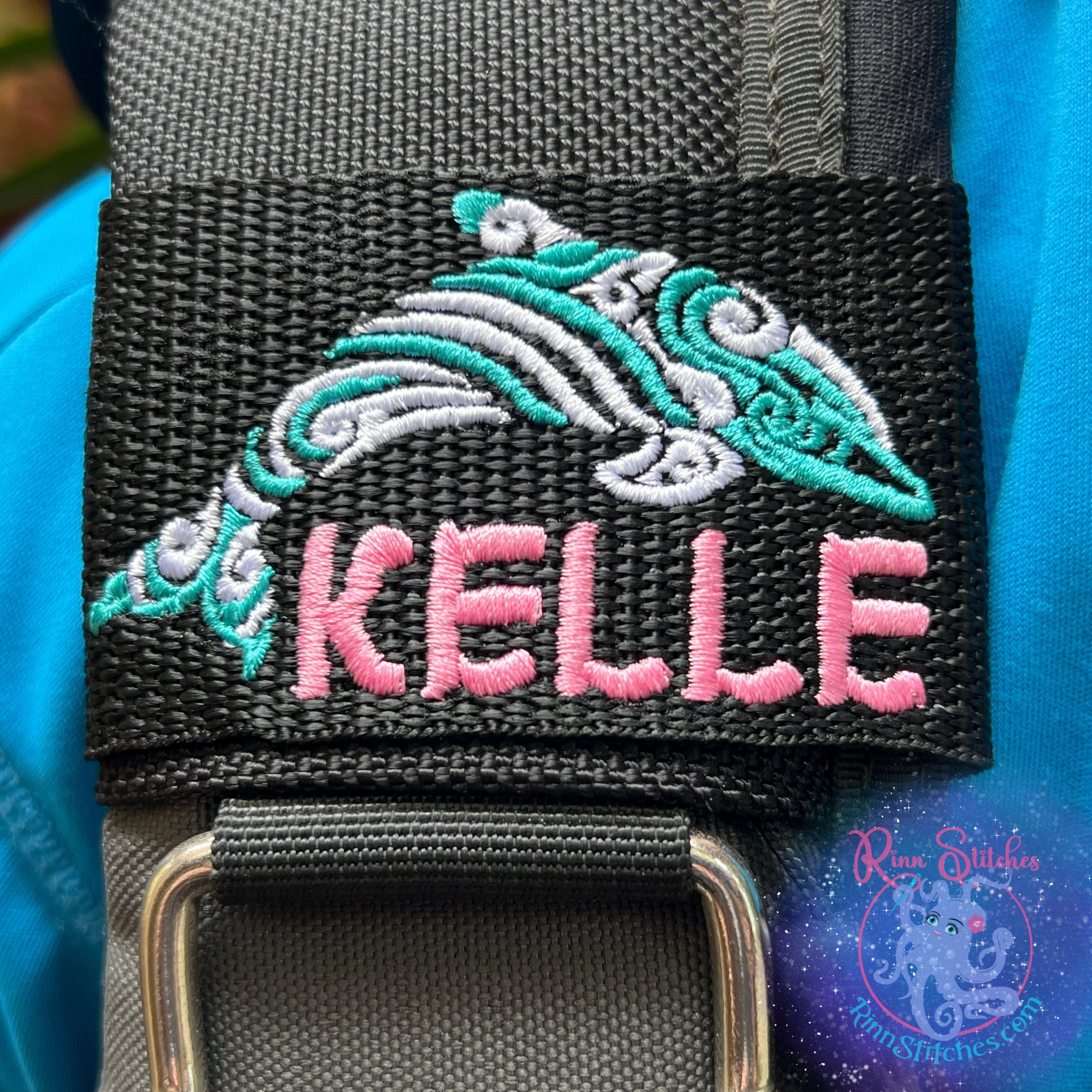 Dolphin personalized BCD tag tribal design Teal and Silver with custom embroidered name Kelle in Pink below scuba diving accessories - Maui Made - Dive Your Vibe