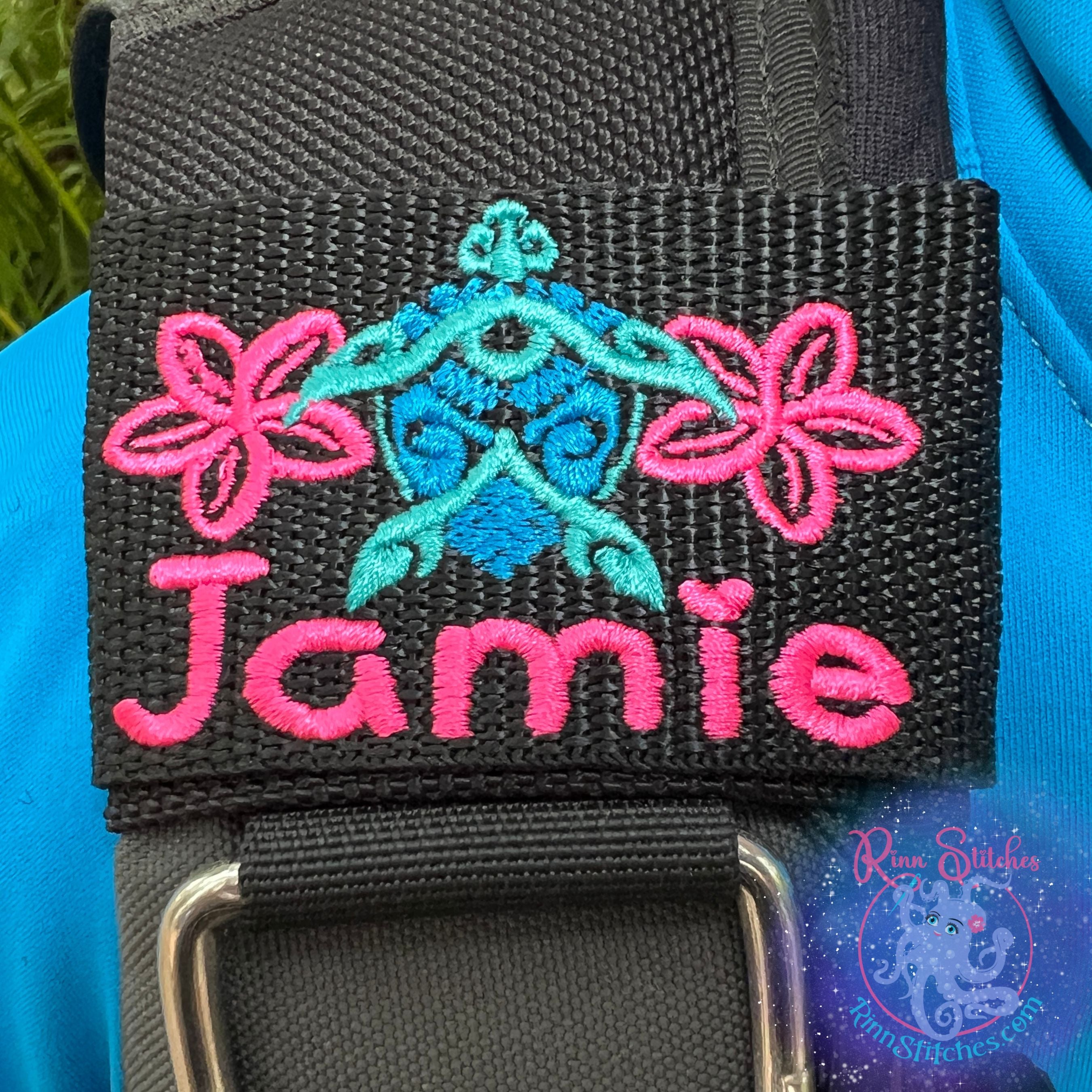 Hawaiian Sea Turtle (Honu) Tiki with Plumerias Personalized BCD Tag by Rinn Stitches on Maui, Hawaii with the name Jamie in Fuchsia in our Haliimaile Font