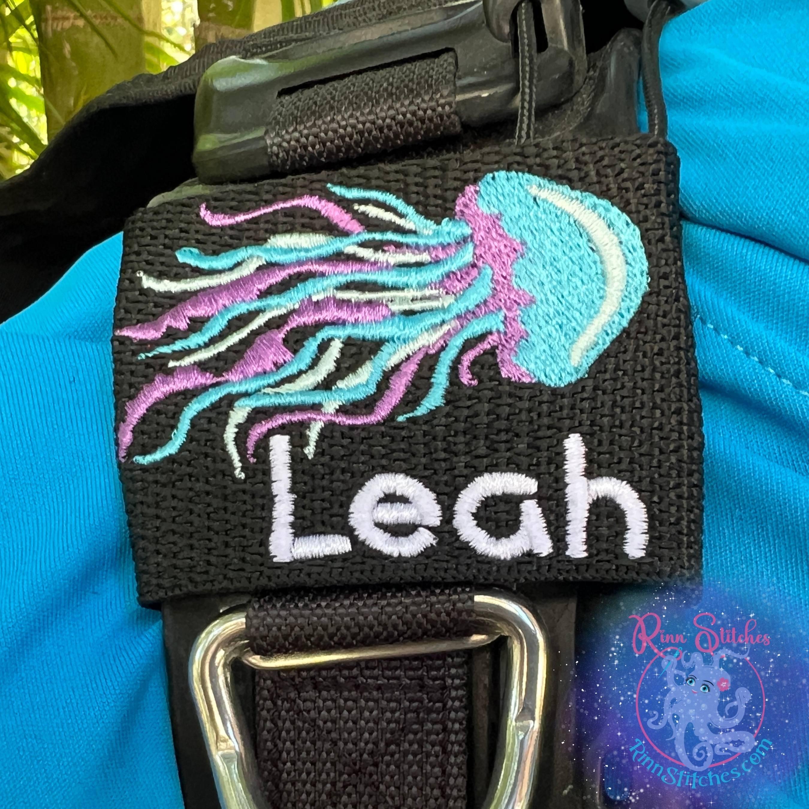 Jellyfish personalized BCD tag blue skies purple sea foam colors custom embroidered name below scuba diving accessories By Rinn Stitches on Maui, Hawaii