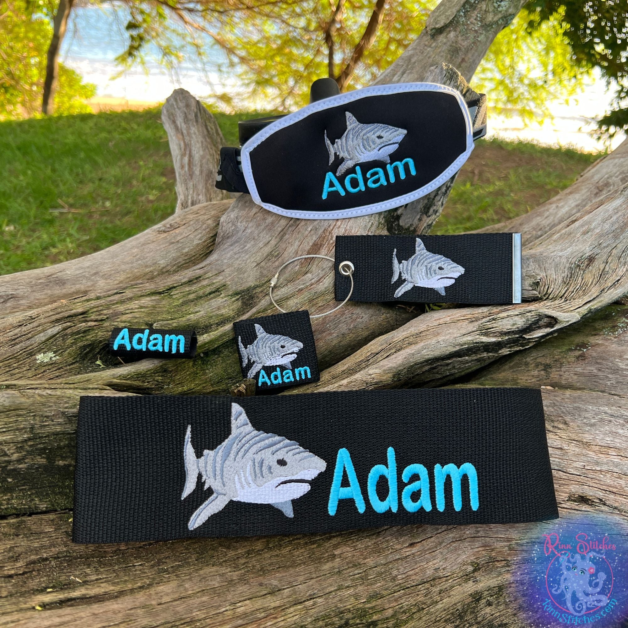 Elite Icon Kit - 5 piece bundle for scuba divers.  BCD Tag, Reg Tag, Mask Strap Cover, Tank Band, and Luggage Tag. Shown flat lay featuring a Tiger Shark Design by Rinn Stitches in Maui Hawaii