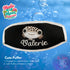 A black neoprene mask strap cover with white piping and an embroidered Cute Puffer Fish with Valerie in white. 