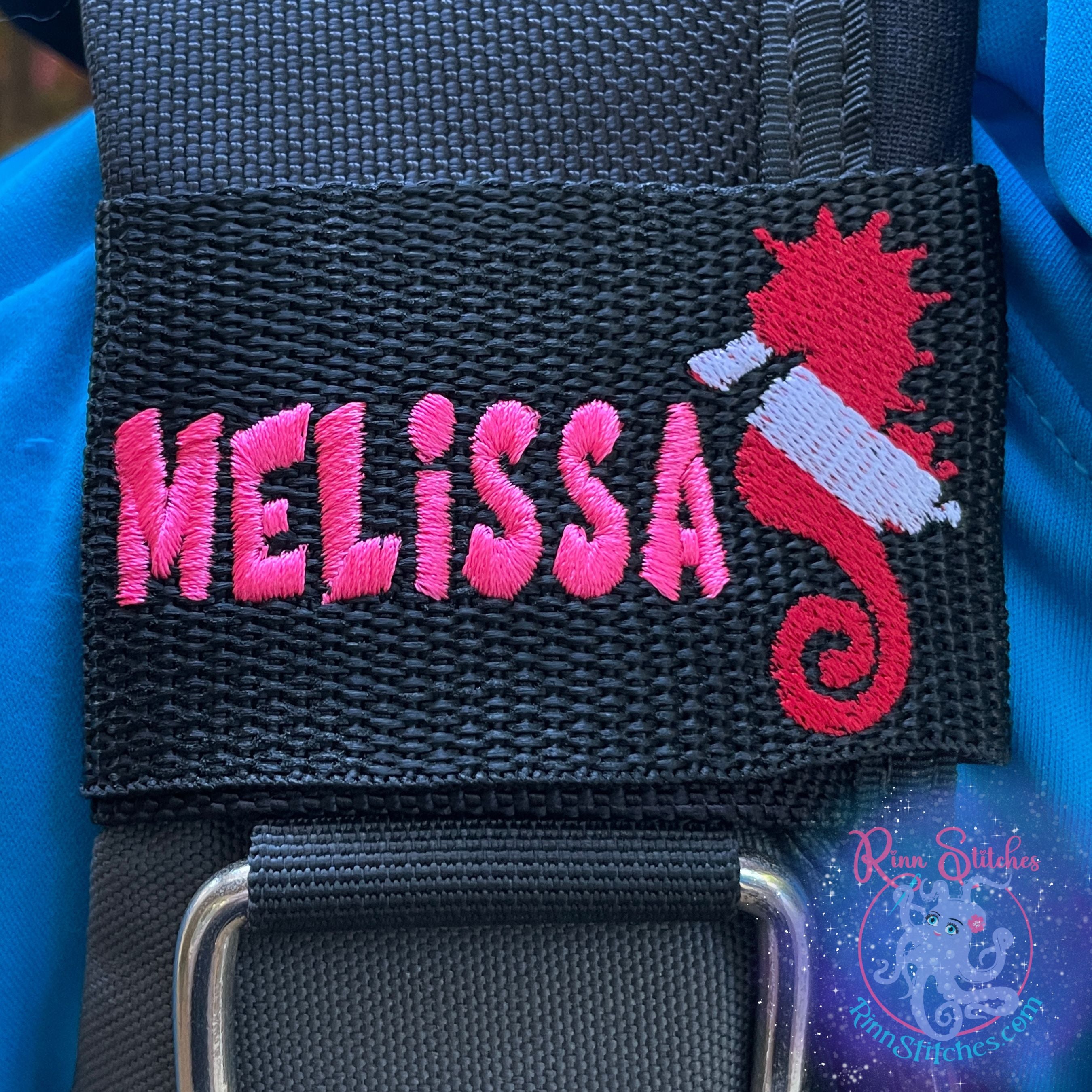 Embroidered Red and White dive flag in the shape of a seahorse personalized with the name Melissa in neon pink thread. Made by Rinn Stitches in Maui, Hawaii