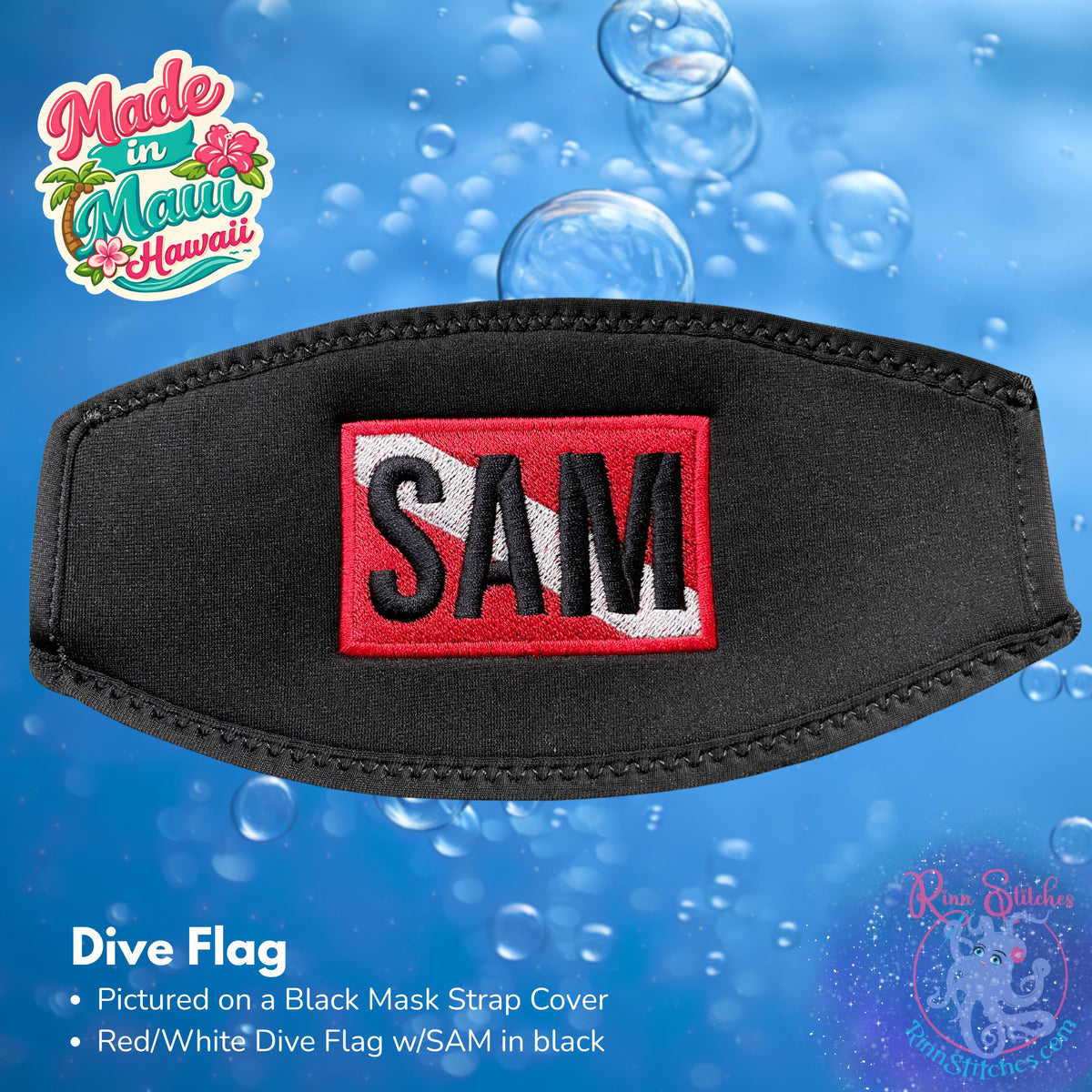 A black neoprene mask strap cover with an embroidered red/white dive flag with SAM in black. 