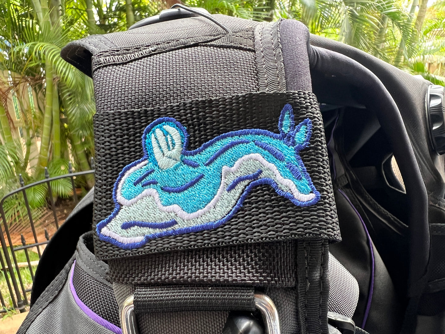 Blue Nudibranch Design Embroidered BCD Tag in Silver, Ocean, Sea Foam, and Blue Abyss Threads made by Rinn Stitches Creative & Unique Embroidery on Maui, Hawaii