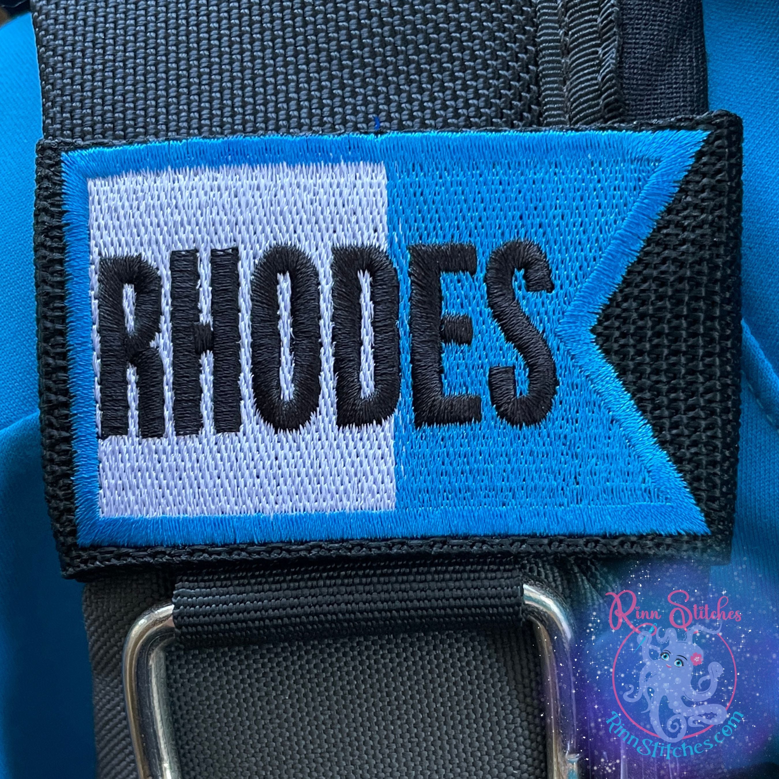 Embroidered International (Aloha) Dive Flag in ocean blue and white with the personalization Rhodes in black thread on top of the flag. Made by Rinn Stitches in Maui, Hawaii