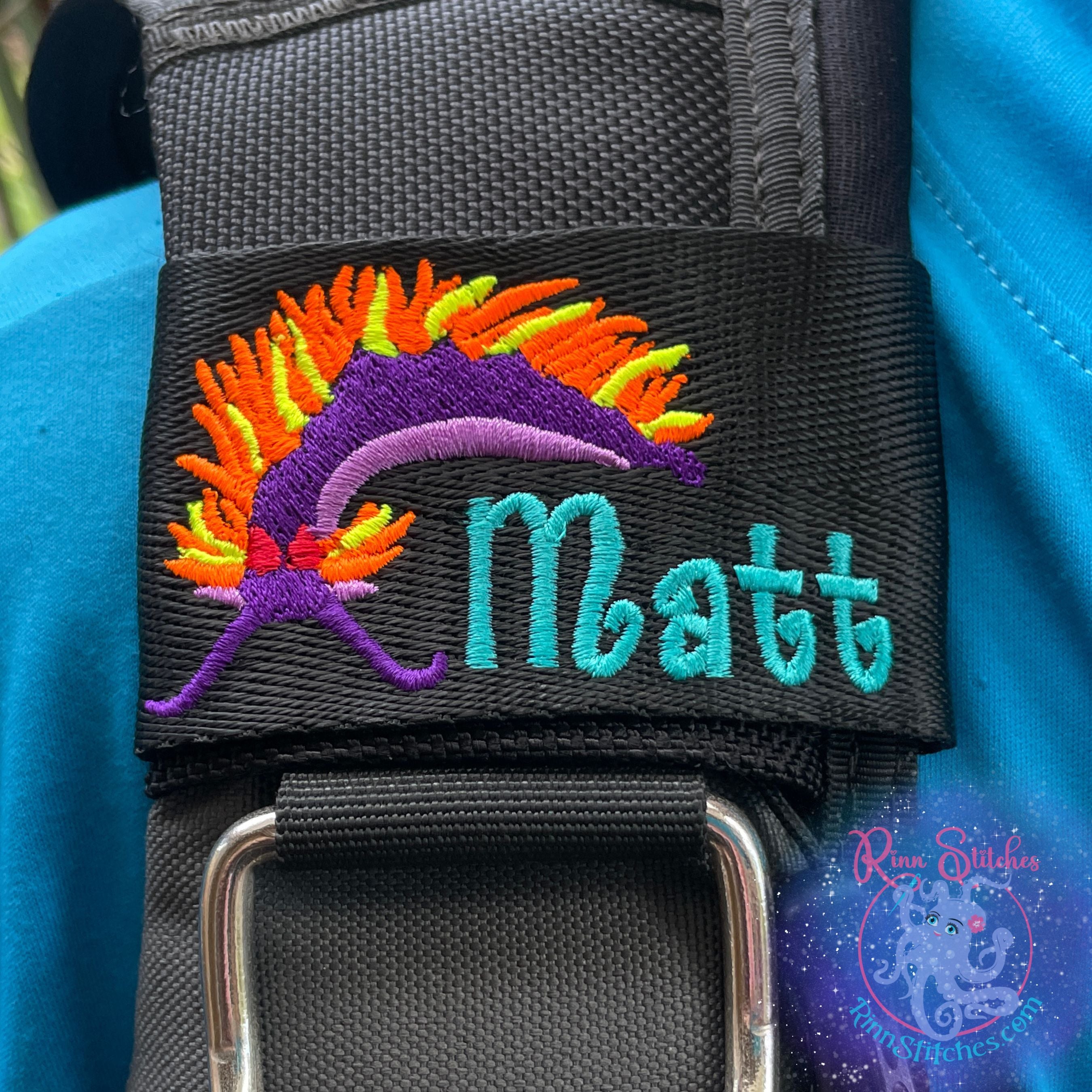 Spanish Shawl Nudibranch Embroidered BCD Tag Personalized with the name Matt in teal Thread. Designed and manufactured by Rinn Stitches on Maui, Hawaii