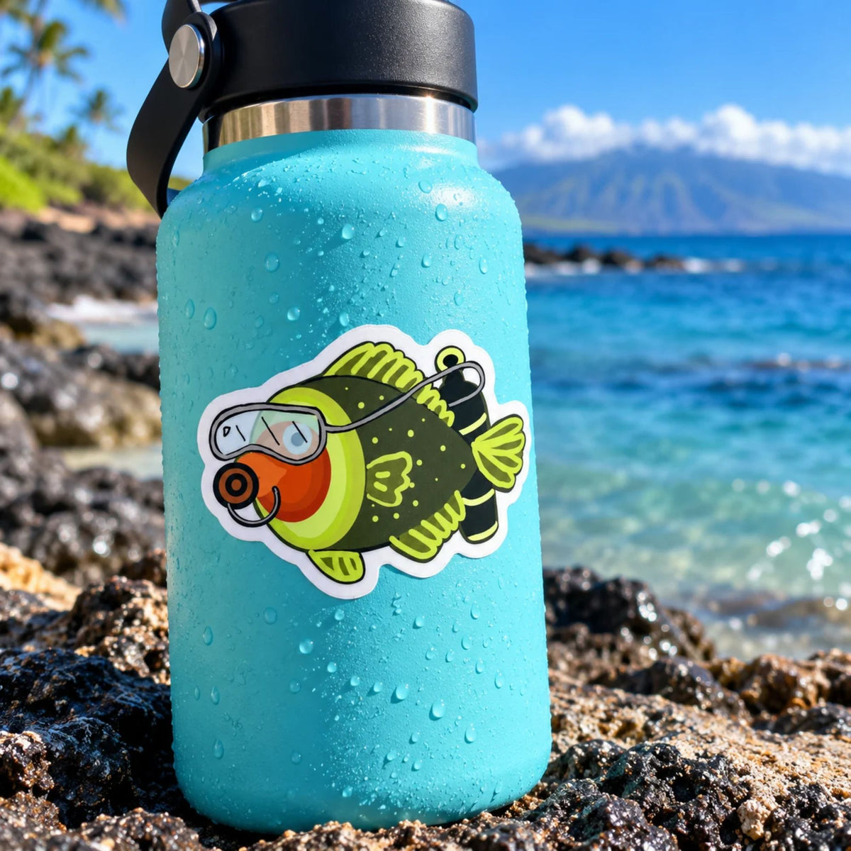 Part avocado part fish, all scuba fun! Vinyl sticker on an aqua blue water bottle and the beach, made by Golden Toad Studio 